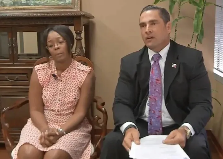 Sam R. Cammack III seated beside Charnesia Corley during an ABC13 interview.